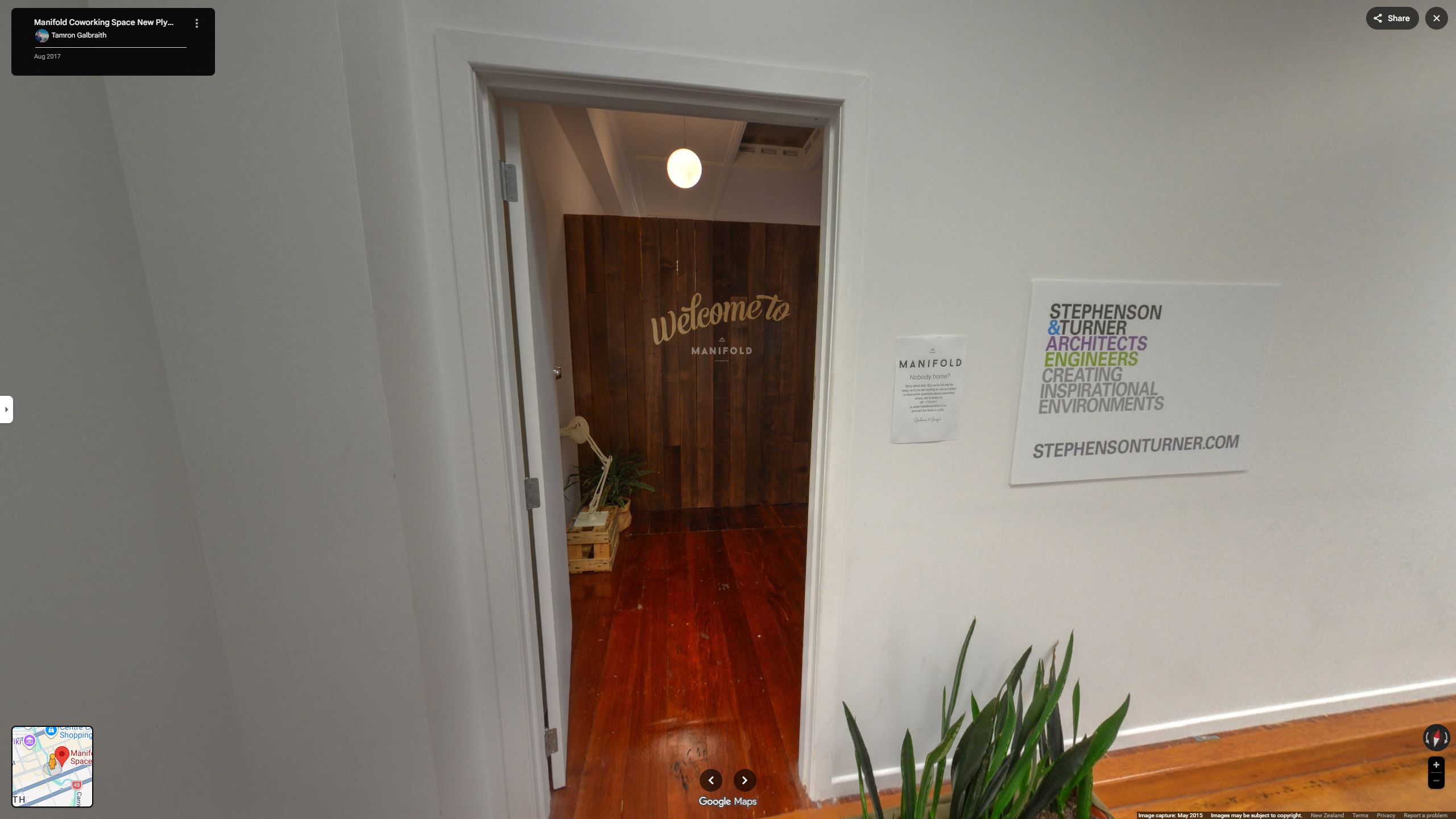 Manifold office interior with polished reception area and modern corporate workspace